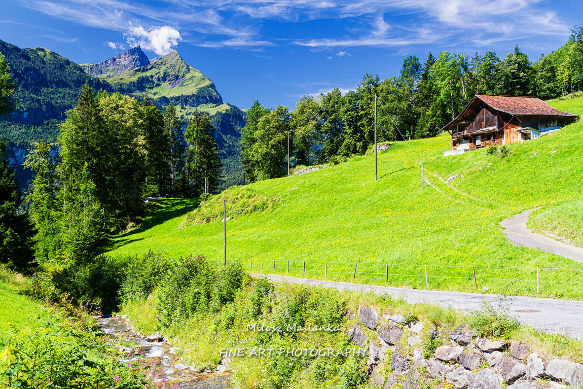 The wooden house amongst the Swiss Alps.