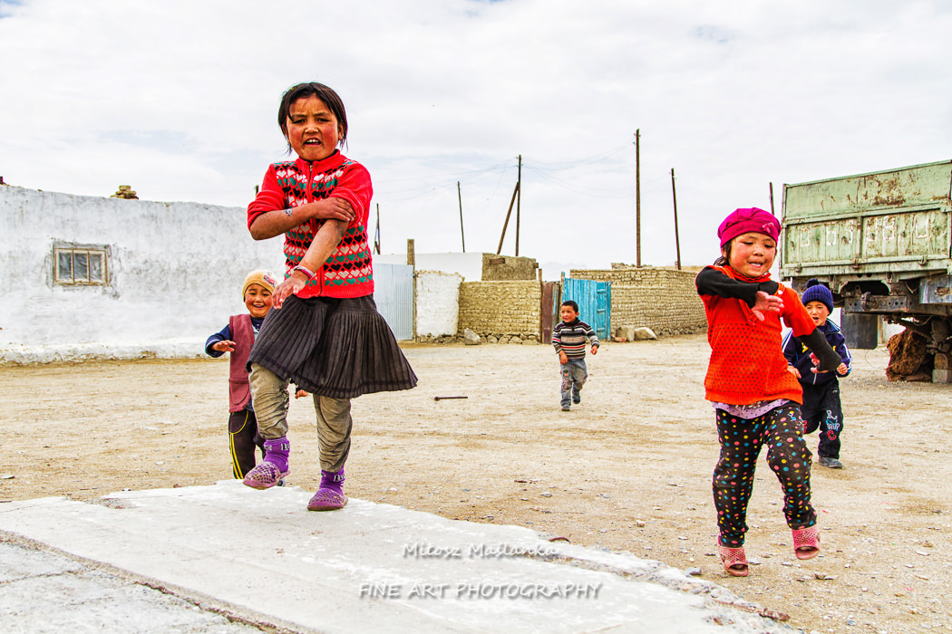 Kids in Bolonkul village, Pamir, Tajikistan. Bolonkul is one of the highest lakes on earth.