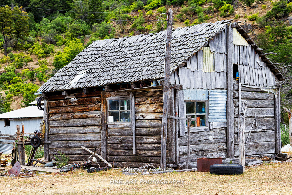 Old weathered wooden building on a farm in Patagonia, Chile