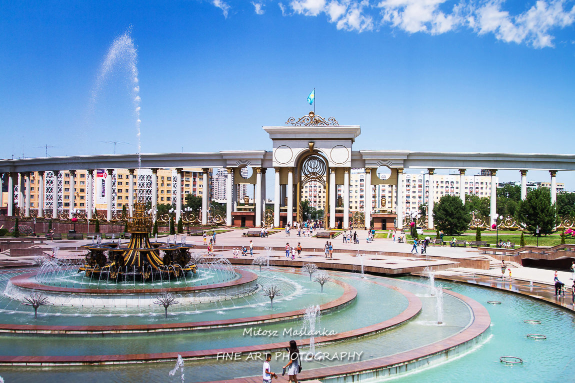 Entrance with arches and columns at dendra park of first president Nursultan Nazarbayev, Almaty, Kazakhstan