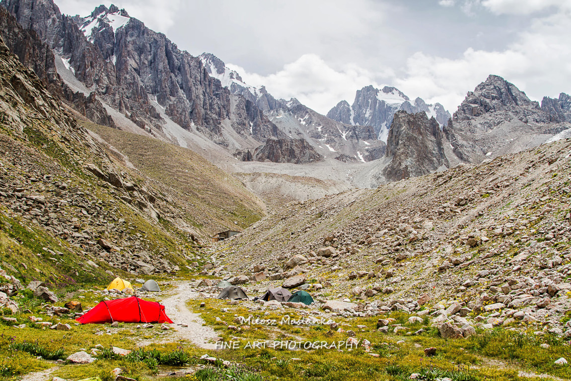 Base camp near Ratsek Hut in Ala Archa national park, Tian Shan mountains, Kyrgyzstan, Central Asia. Base is a starting point for mountaineering and climbing in upper parts of mountains.