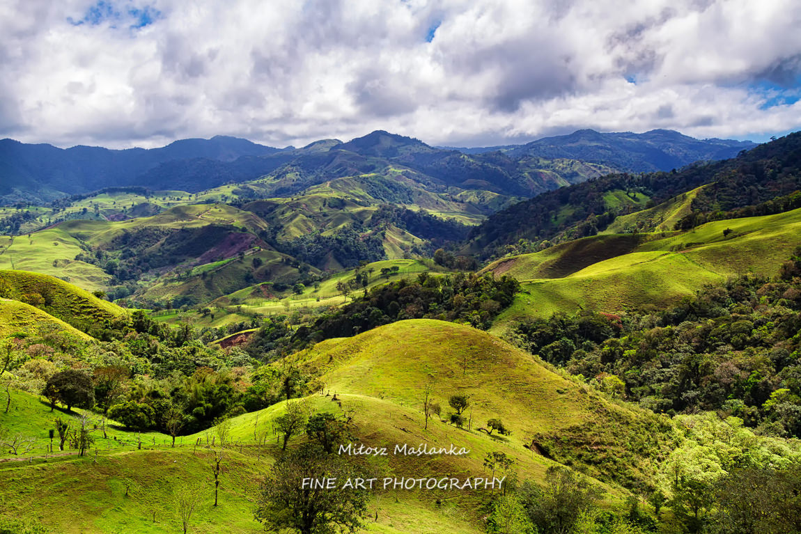 Monteverde, Santa Elena and Arenal area in Costa Rica highlands. Panoramic view in sunny day of a vast hills and mountains in this pristine region of Central America