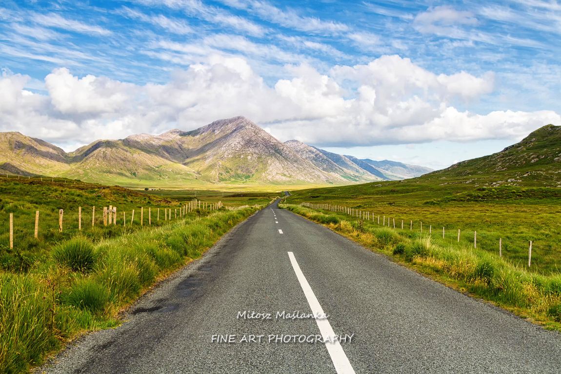 Scenic Inagh Valley during long days of Irish summer. Beautiful landscape of surrounding mountains called Twelve Bens