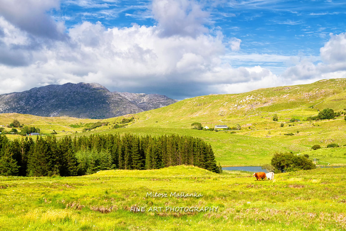 Scenic Inagh Valley during long days of Irish summer. Beautiful landscape of surrounding mountains called Twelve Bens