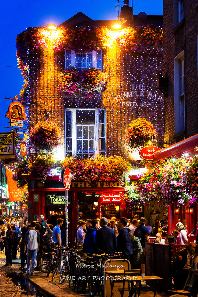 Street scene in Dublin, Ireland. Temple Bar historic district is known as Dublins cultural quarter with lively nightlife.