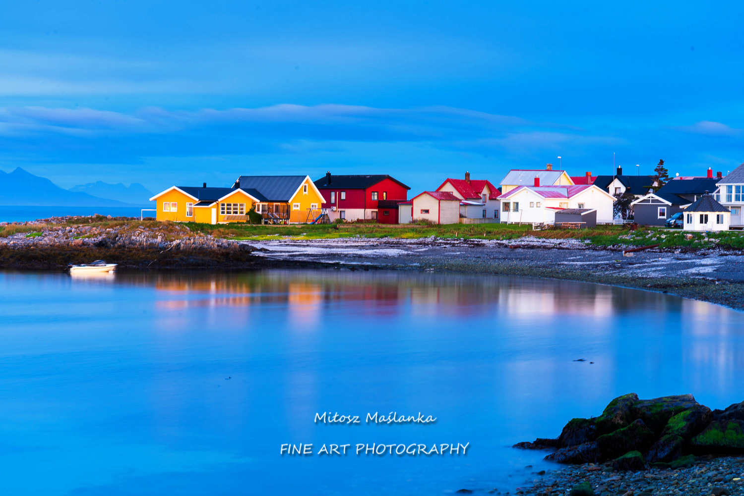 Norwegian rural houses in Andenes, Andoya, Lofoten Islands, Norway. Soft water effect at a blue hour.